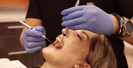 dentist with patient needing urgent care