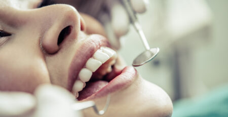 dentists treat patients teeth