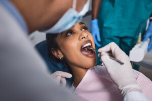 young woman having dental work done her teeth