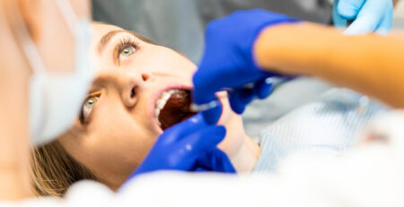 patient working with dentist at Lumina