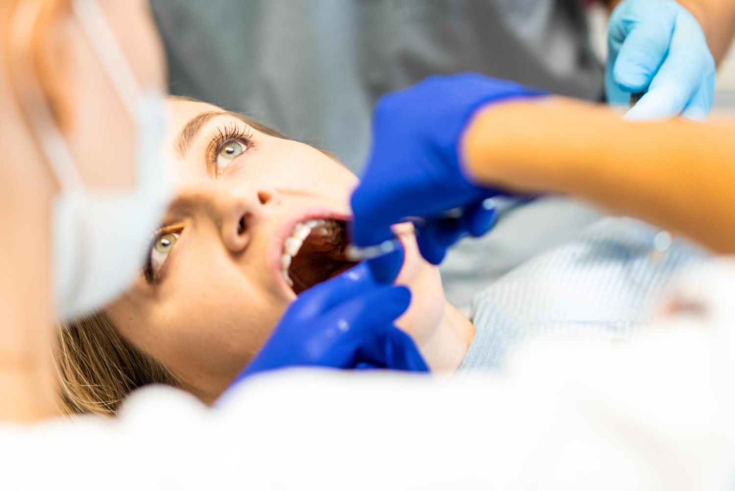 patient working with dentist at Lumina